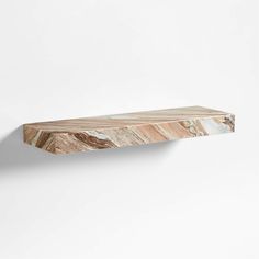 the shelf is made out of wood and marble