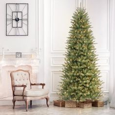 Brighten up your home for the holiday season. Slim Fraser fir tree pre-lit with 500 clear UL lights and 1,453 realistic PVC tips. This artificial Christmas tree has a full and lively shape. This Christmas, let a beautiful Puleo International tree become part of your holiday tradition! Puleo International | Puleo International 7.5' Green Fir Artificial Christmas Tree w/ 500 Clear Lights w/ Stand | Size 7' 6'' H | Joss & Main 5’ Christmas Tree, Best Chrisymas Tree, 12’ Christmas Tree, 4’ Christmas Tree, Best Christmas Trees Artificial, Slim Christmas Trees, Green. Hristmas Tree, 6 Ft Prelit Christmas Tree, Minimalsit Christmas Tree