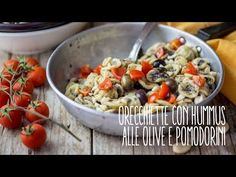 pasta with tomatoes and mushrooms in a bowl