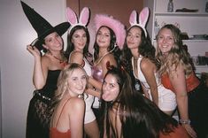 a group of women dressed up in bunny ears