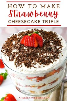 strawberry cheesecake trifle in a glass dish with strawberries on top