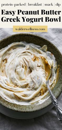 a bowl filled with whipped cream and topped with peanut butter