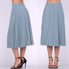 Oooo La La! This Skirt Is Perfect For The Spring, Summer Or Fall. Features: - Botton Down Front Closure - Pleated Design - Tailored Waist - Belt Loop Accent( No Belt Included) - Flowy Skirt - Lightweight - Midi Length Fabric: 100% Matte Polyester Fit: True To Size Women. Fitted At Waist Then Flowy Lower Chic Midi-length Bottoms With Buttons, Chic Midi Length Bottoms With Buttons, Fitted Midi-length Bottoms With Buttons, Fitted Midi Bottoms With Buttons, Casual Midi Skirt With Button Closure For Day Out, Midi Length Bottoms With Button Closure For Day Out, Casual Midi Bottoms With Button Closure For Day Out, Spring Workwear Pleated Skirt With Buttons, Fitted Pleated Skirt With Buttons For Spring