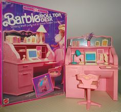 a pink barbie doll desk and chair set