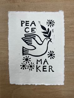 a piece of paper that says peace is the ma'ker with a bird on it