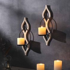 PRICES MAY VARY. WHITE BLACK CANDLE SCONCE- Add an eye-catching look to any space with Hollow flower shape pair of wall sconce candle holders. Any combination of shapes is possible.It measures 15.8inch X 6.3inch ,Disc diameter 2.95 inch MATERIAL-Our candle sconce is made of wood with metal, hard, not easily deformed. You can use it for a long time with no special maintenance is required.It shows a variety of styles and perfect decor for the any room. Such as living room, bedroom, bathroom, dinin Wall Scones Decor Ideas, Candle Holders Wall, Wall Mounted Candle Holders, 2 Candle, Black Candle, Wall Scones, Wood Candle, Metal Welding, Wood Candle Holders