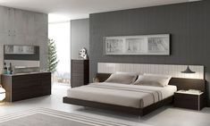 a modern bedroom with gray walls and white carpeted flooring is pictured in this image