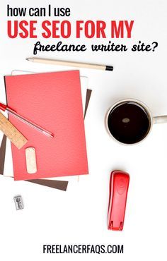 a cup of coffee next to a red folder and pen on top of a white table