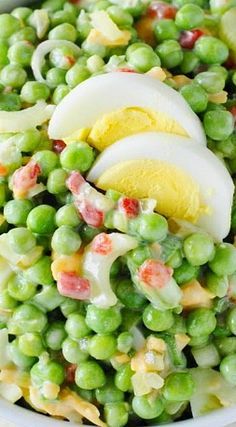 peas and eggs are mixed together in a salad