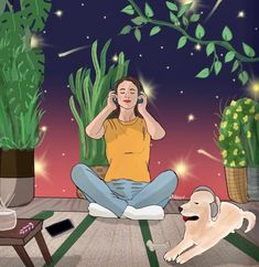 a woman sitting on the floor talking on her cell phone next to a dog and potted plant