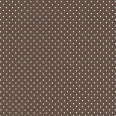 a brown background with white polka dots