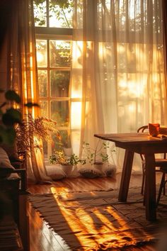 the sun is shining through the curtains in this living room with a table and chairs