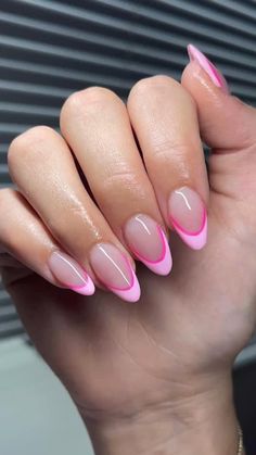 Short almond shaped acrylic nails with light pink French tip with a dark pink accent Almond Nails Pink, Acrylic Nails Almond Shape, Pink Tip Nails, French Tip Acrylic Nails, Her Nails, Classy Acrylic Nails, Almond Acrylic Nails, Almond Shape, Almond Shaped