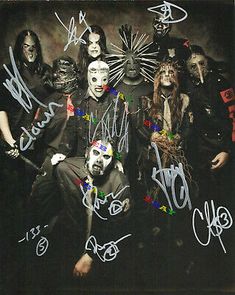 an autographed photo of the band slipknots with signed autographs