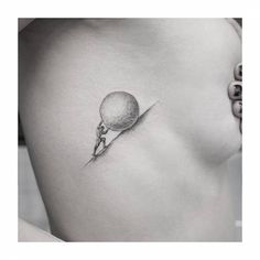 a woman's stomach with a small tattoo on it, and an image of a man