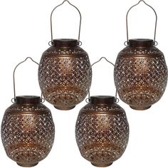 set of three metal hanging lanterns with intricate designs on each one side and an open top