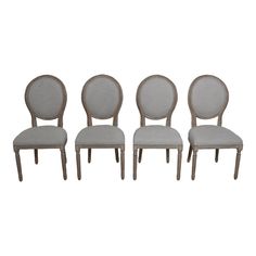 set of four chairs with upholstered backrests and fabric seat cushions in grey linen