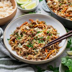 a bowl filled with rice, meat and veggies