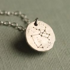 This beautiful zodiac star sign charm necklace is made from recycled sterling silver which has been engraved with the constellation for the star sign of your choice. The disc is a very wearable and dainty size, measuring just 1cm across. Included with the necklace is a hand designed gift certificate, which explains the zodiac constellation and includes a little information about the qualities associated with your starsign. The necklace chain is available in a variety of lengths.  Please refer to Star Sign Necklace, Astrology Jewelry, Sign Necklace, Tiny Charm, Zodiac Star Signs, Zodiac Constellations, Gift Certificate, Star Sign, Gift For Girlfriend