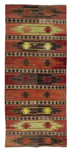 an area rug with different colors and designs on the side, including red, green, brown