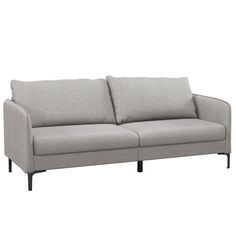 a gray couch sitting on top of a white floor