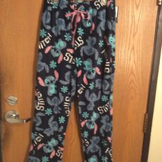 Nwt Disney Ladies Blue Stitch Fleece Pajama Pants 1x.100% Polyester Length 40 Inseam 28 Waist Left To Right 16 Fuzzy Pajama Pants, Black Pajama Pants, Stitch Pajamas, Mickey Mouse Pajamas, Flannel Nightgown, Black Pajamas, Fleece Pajama Pants, Disney Pajamas, White Pajamas