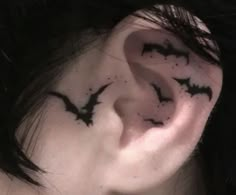 the ear is decorated with black bats