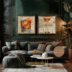 a living room filled with furniture next to two pictures on the wall and a coffee table in front of it