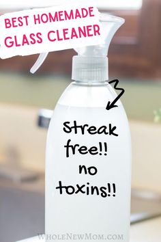 a bottle of homemade glass cleaner sitting on top of a counter