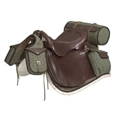 a brown and green horse saddle sitting on top of a white floor next to a bag