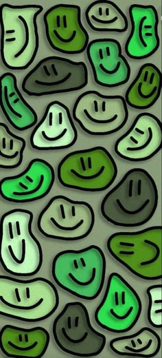 some green and white smiley faces on a gray background