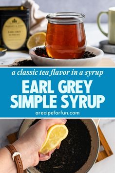 a person holding a lemon in front of a bowl of tea and a jar of syrup