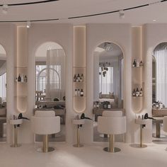 the interior of a modern salon with mirrors and stools