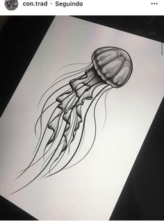 a drawing of a jellyfish on white paper