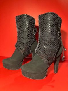 Add a little sparkle to any outfit with these black sequin boot covers! They feature a faux diamond strip down the center front, and lace up the back. They can be used over most boot styles. Elegant Black Sparkling Boots, Black Winter Boots With Rhinestone Rivets, Evening Glitter Ankle-high Boots, Black Glitter Ankle Boots, Leather Rhinestone Ankle-high Boots, Sparkle Fabric, Leopard Print Boots, Sequin Boots, Boot Covers