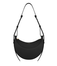 With its rounded shape, foam padding, and hand-stitching, the “Numéro Dix” is a nod to the equestrian codes of saddlery. Its half-moon design highlights juxtaposing curves. Black Leggings Outfit, Latest Handbags, Winter Bags, Bag Collection, Black Textures, Moon Design, Mecca, Fall 2023, Black Bag