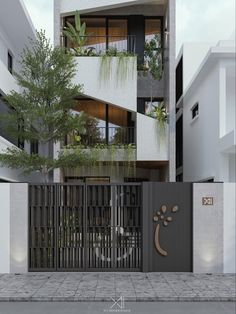 the entrance to an apartment building with plants growing on it's balconies