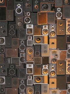 many different speakers are stacked on top of each other in the same pattern as they appear to be made out of metal