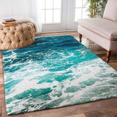 a living room with a rug that has waves on the floor and in front of it