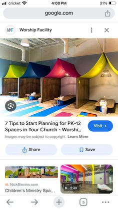 an iphone screenshot shows the inside of a building with several different colored tents on it