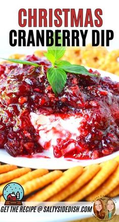 christmas cranberry dip on a plate with crackers in the background and text overlay