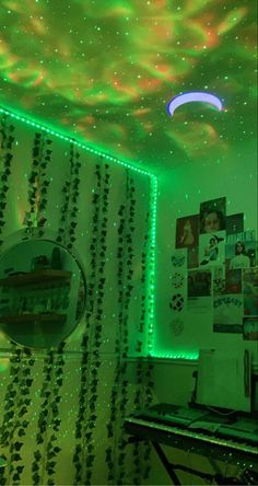 a room that has green lights on the ceiling