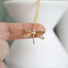 "Dragonfly necklace made of gold color dragonfly pendant with skinny gold plated brass chain. Soft and simple. Great for gift , everyday or special occasions.  Your item will ship in a gift box. Please feel free to contact me if you have any questions. ♥ Length  14\" - 20\" ♥ Pendant Approx. 5/8\" x 7/8\" ♥ Gold plated over brass  ♥ Delivery Time Fast shipping within 1 - 3 days  ♥  See more Rudiana Accessories  Rudiana.etsy.com" Dragonfly Accessories, Dragonfly Jewelry Necklace, Dragonfly Necklaces, Dragonfly Gifts, Pretty Jewelry Necklaces, Dragonfly Jewelry, Retro Accessories, Dragonfly Necklace, Dragonfly Pendant