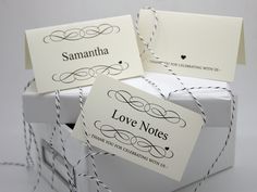 three love notes are wrapped in twine and tied to a box with twine