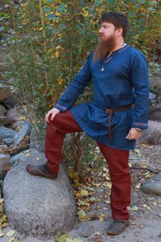 Linen Viking Age Pants in Dark Earthy Red  These pants come with a brown drawstring that can be switched out with other drawstring colors available in the shop. After years of perfecting patterns and materials our pants we are finally in production and available for preorder.  Now these pants have been tricky and time-consuming. Through my reenactment journey I've gone through quite a few pairs, there's only so many times you can patch pants before you decide: enough is enough - we must make our own.  Plenty of gusset room but no unnecessary seams that are destined to rip.  Adjustable waist, but no elastic or thin drawstring to cause discomfort. Room in the knees and a fabric that is thicker to withstand the adventures.  It's a Goldilocks project and we finally found mix that is juuust the Viking Pants Woman, Pagan Pants, Viking Leather Pants, Viking Trousers, Viking Pants, Historically Accurate Viking Clothing, Patch Pants, Viking Age, European Linens