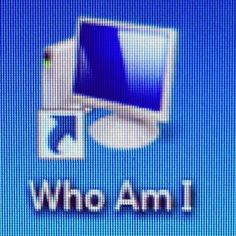 an old computer screen with the words who am i?