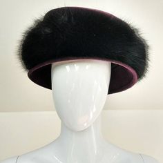 Description: 1990s Vintage 100% Rabbit Hair Eggplant/Purple & Black by Phillip Treacy! Yes, even the foundation of the hat, which looks like wool, is actually made of rabbit hair. The most iconic milliner in the world created this exquisite hat for Neiman Marcus. Interior has silky navy lining with gold Phillip Treacy London logo along with a Neiman Marcus and second Phillip Treacy label. This hat is in superb condition and is wearable right NOW!   Treacy's hats have been famously worn by Sarah Jessica Parker, his muse Isabella Blow, along with just about every member of the English Royal Family. In fact 36 Treacy hats were worn at the wedding of Kate Middleton. Exquisite! Brand/Designer: Philip Treacy for Neiman Marcus Period/Year: 1990s Origin: Made in UK Condition: Excellent. Color: Pur Phillip Treacy, Isabella Blow, English Royal Family, London Logo, Philip Treacy, Eggplant Purple, Sarah Jessica, Sarah Jessica Parker, Black Hat