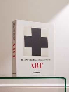 the impossible collection of art by assouliane is displayed on a glass shelf