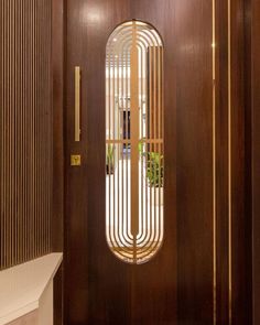 a wooden door with a decorative glass window