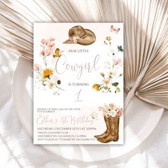 a little cowgirl is on the way baby shower card with flowers and cowboy boots